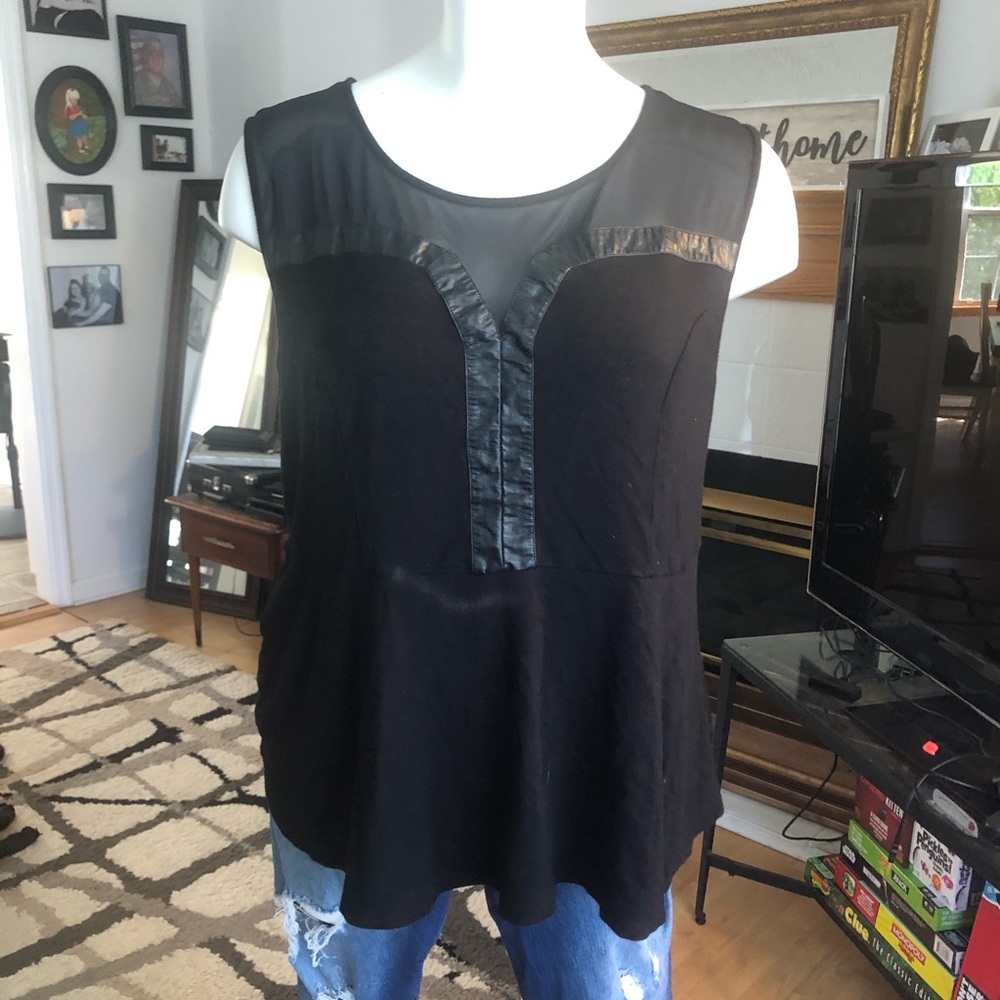 Torrid black peplum top with faux leather and mesh